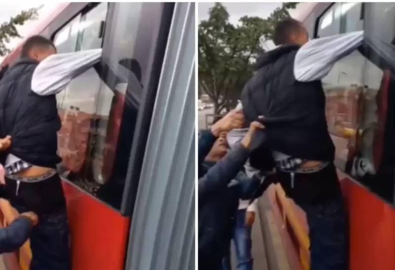 [VIDEO] Ladrón quedó colgando de la micro y pasajeros le robaron y empezaron a golpear