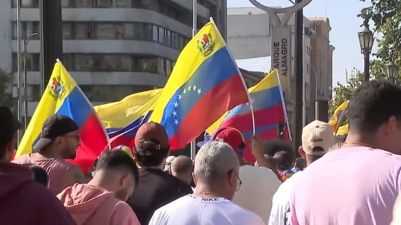 Venezolanos en Chile | Captura: T13