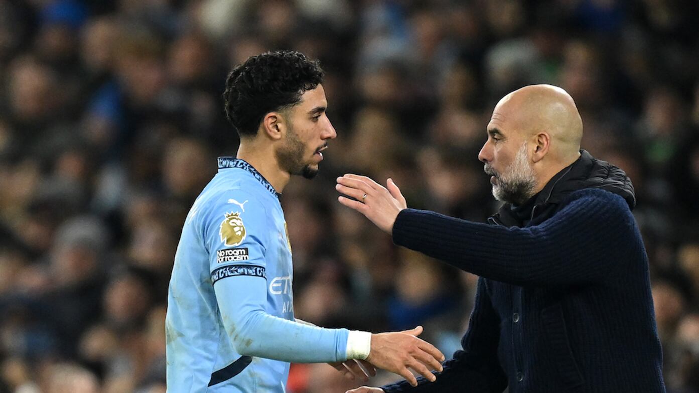 Omar Marmoush y Josep Guardiola / Getty