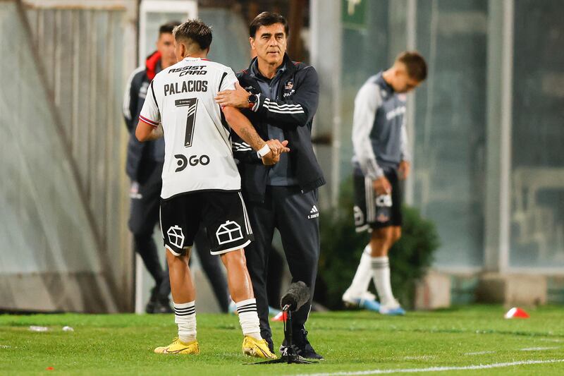 Carlos Palacios y Gustavo Quinteros. / Photosport