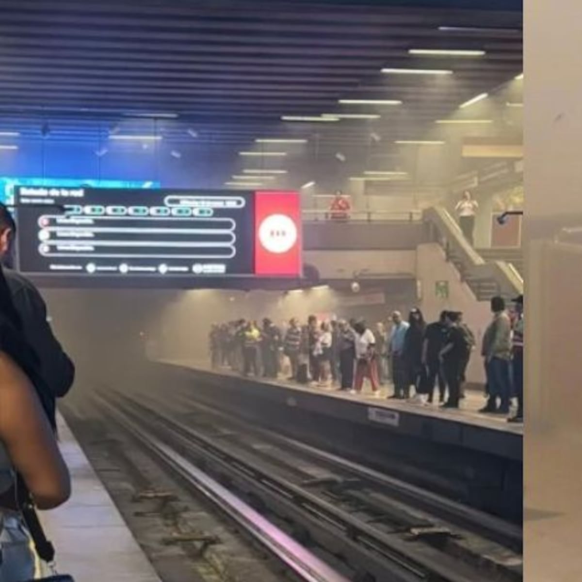 Pasajeros alarmados por humo en estación Baquedano Pasajeros alarmados por humo en estación Baquedano