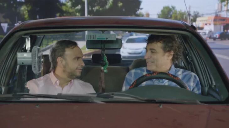 El periodista junto a Tito Larraín. Captura de Mega.