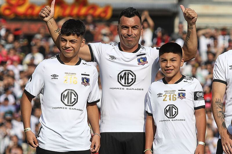 Esetban Paredes junto a sus hijos, Esteban y Vicente